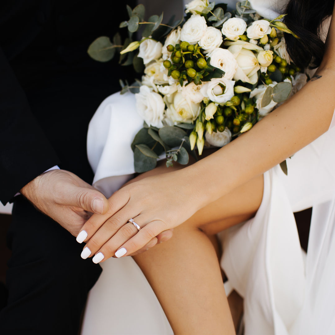 Picture of a Bride and Groom holding handsLuxury wedding gifts and custom candle favors for couples, bridesmaids, and unforgettable romantic moments