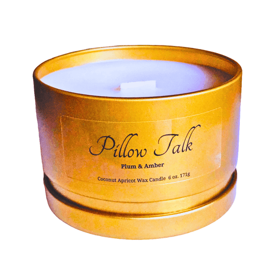 Plum and Amber scented luxury eco-friendly candle in a gold metal travel tin handcrafted with natural, cruelty-free, hypoallergenic and clean ingredients.